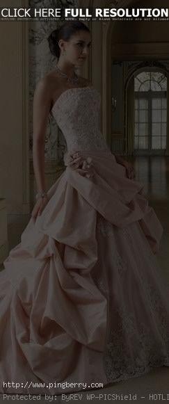 This dress is stunning! Not a fan of a pink wedding dress but it's pretty :)...